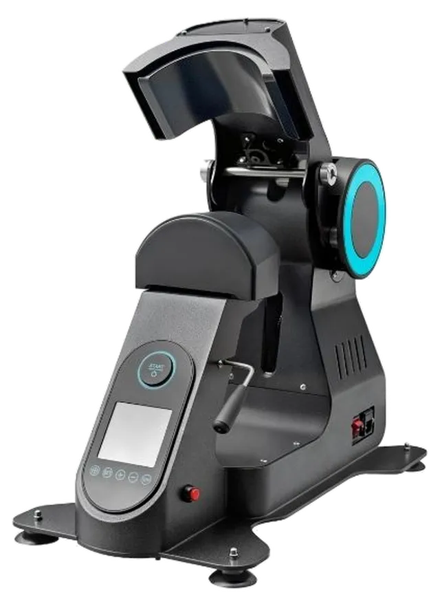 RIVO Cappa Super, dynamic three-quarter view of the black cap press with its cyan accent ring